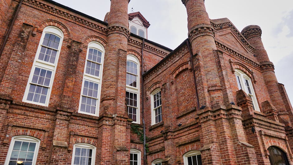 Historical brick courthouse with arched windows